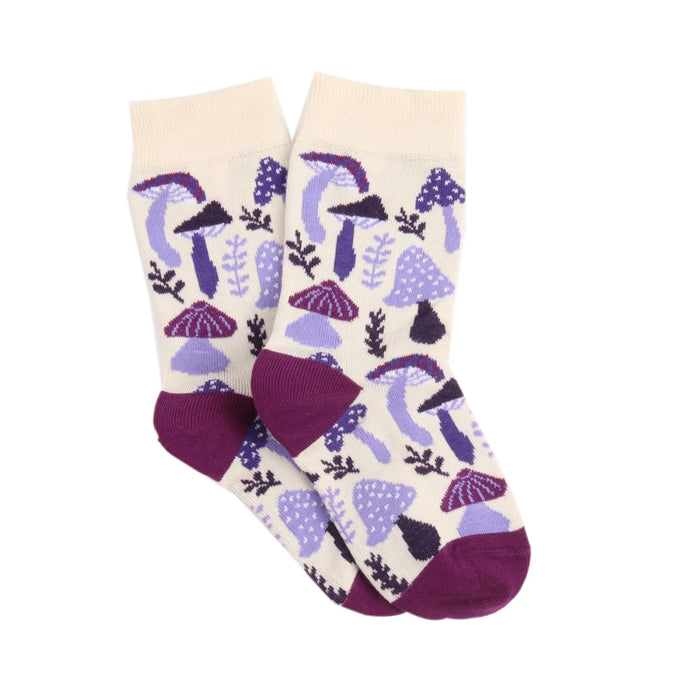 Pair of socks with purple mushroom pattern on a white background