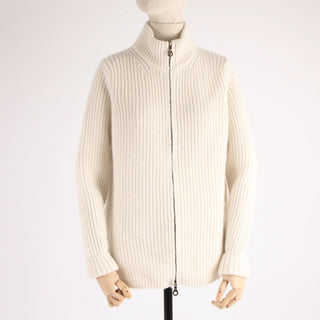 White ribbed knit cardigan on a mannequin against a white background