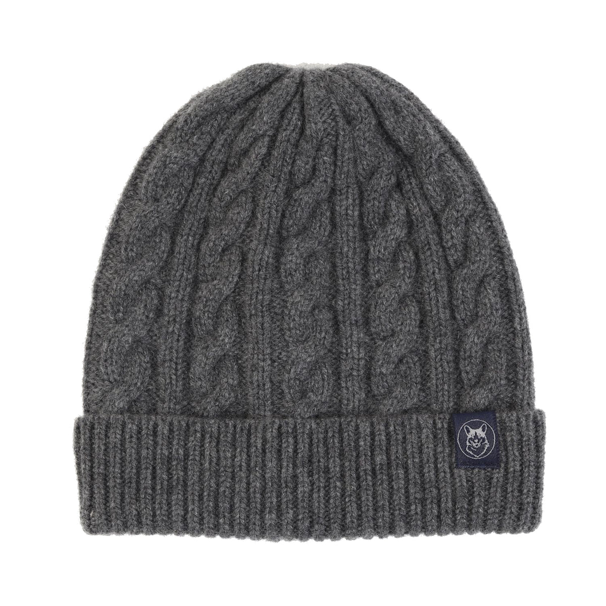 A dark gray cable-knit beanie hat with a folded cuff, featuring a small navy blue brand patch on the side.