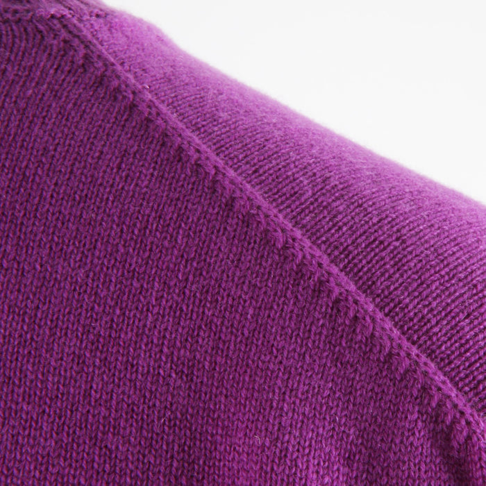 A close up detail of the shoulder shapings in the knitted garment