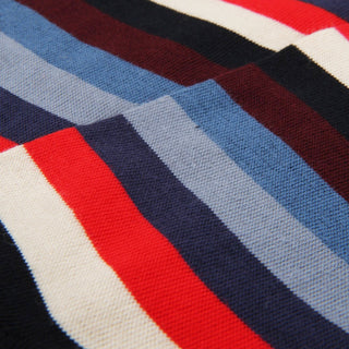 Close-up of striped fabric with red, blue, and white colors.
