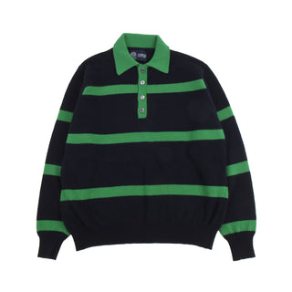 Black and green striped sweater on a white background