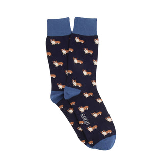 Navy socks with corgi dog all over pattern photographed on a white background