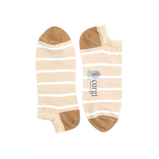 Pair of beige socks with white stripes and 'Corgi' branding on a white background