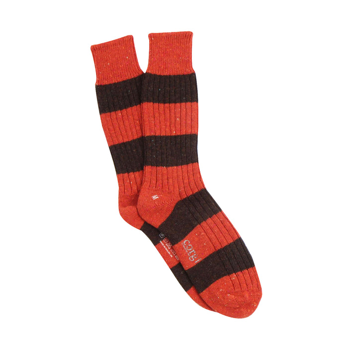 Orange and brown striped sock on a white background