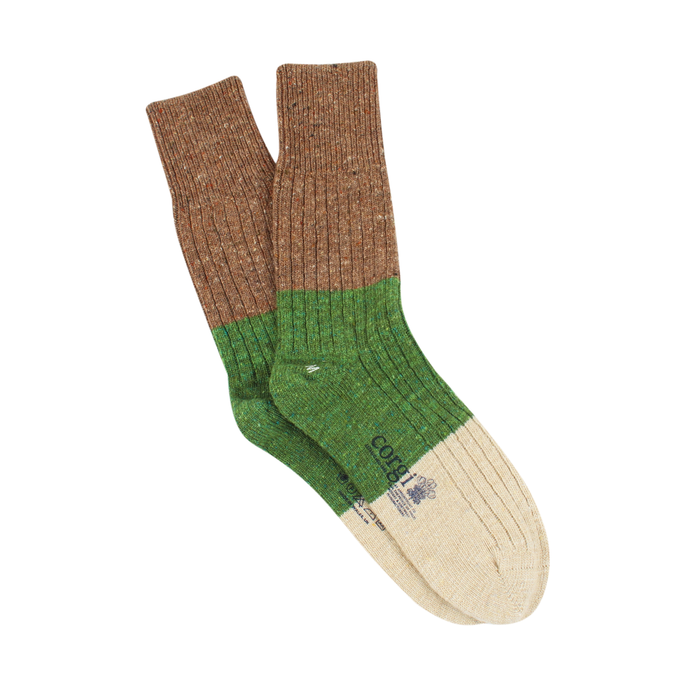 A pair of men's color block donegal wool socks with a green and brown design, showing a ribbed cuff and reinforced heel.