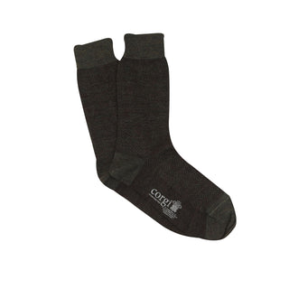 A pair of men's formal herringbone merino wool socks in khaki.
