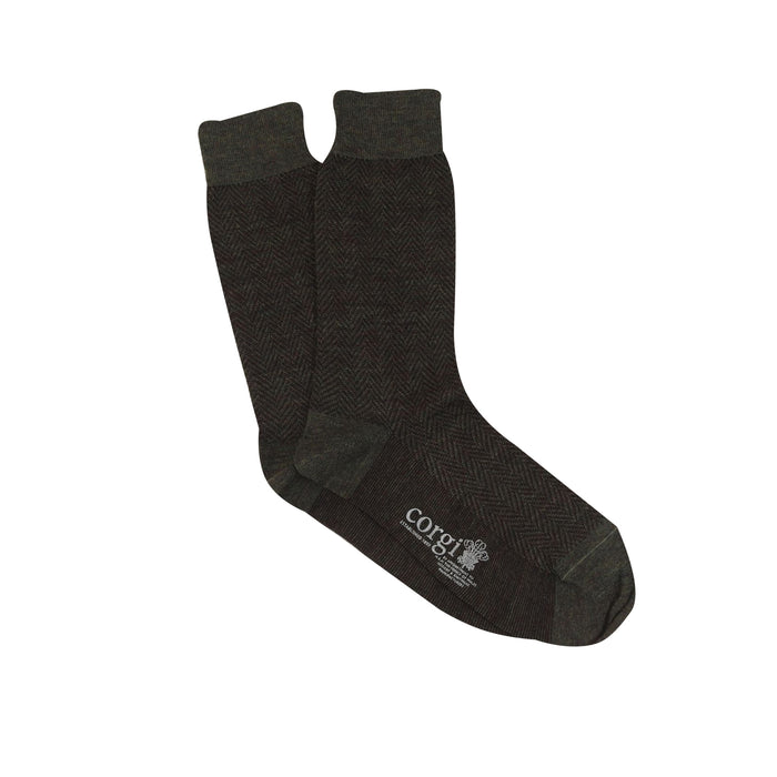 A pair of men's formal herringbone merino wool socks in khaki.