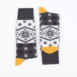 A pair of men's socks with a vintage fair isle pattern, featuring a geometric design in grey and yellow colours.