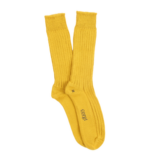 yellow pure cotton boots socks laid flat on a white background