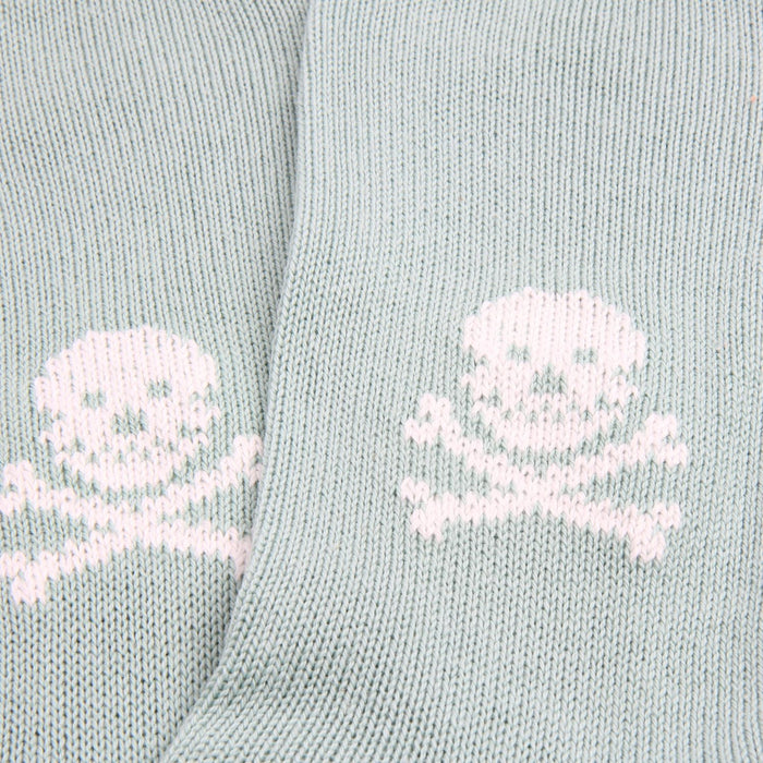 Light aqua socks with white skull and crossbones design.