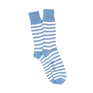 Pair of blue and white striped socks on a white background