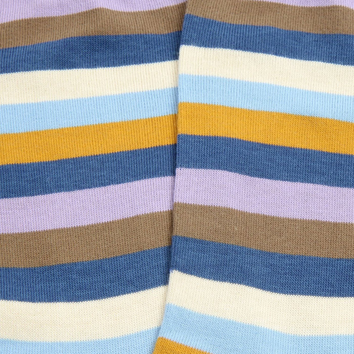 Close-up of striped socks with blue, brown, yellow, and white colors.