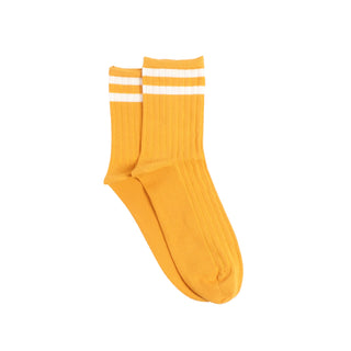 Yellow socks with two fine white stripes at the top section of the sock photographed on a white background