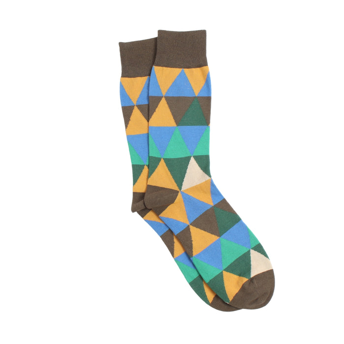 Colourful geometric-patterned sock photographed on a white background