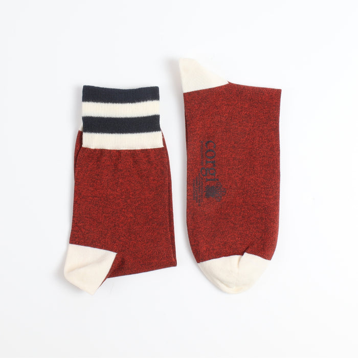 Red socks with white accents on a white background