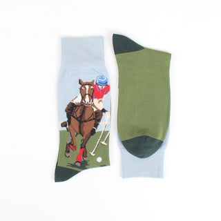 Two socks with horse and jockey design on a white background