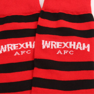 Red and black striped socks with 'Wrexham AFC' text on a white background