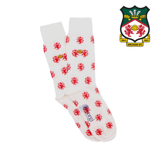 White sock with red dragon pattern and Wrexham AFC logo on a white background