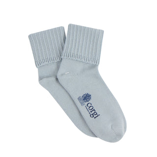 Pair of light blue socks with a brand logo on a white background