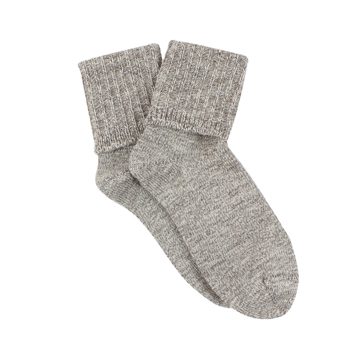 Pair of gray socks on a white background