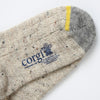 close up detail of the toe and the yellow line