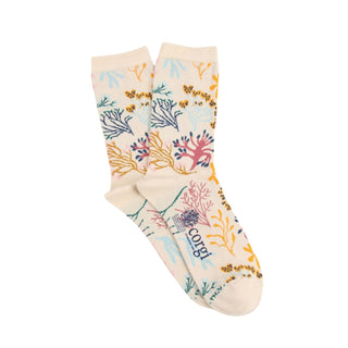 Pair of socks with coral reef design on a white background