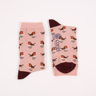 Pair of socks with robin design on a pink background