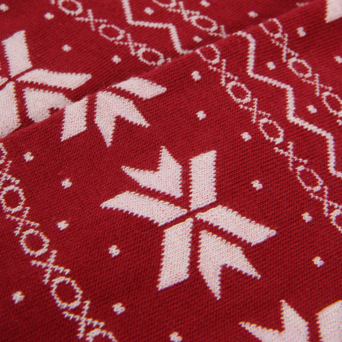 Red fabric with white snowflake pattern and 'ho ho ho' text