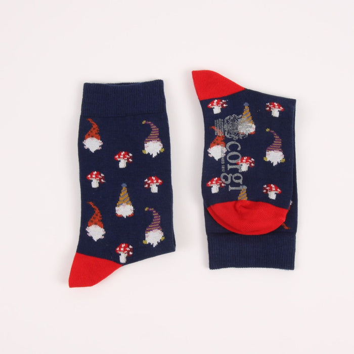 Pair of socks with gnome and mushroom pattern on a white background