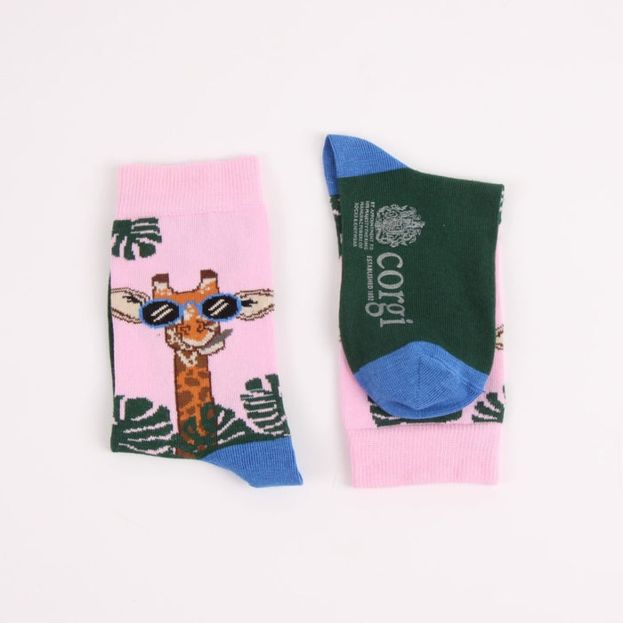 Colourful socks with a giraffe design on a pink background