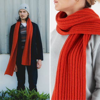 A person wearing a furnace chunky ribbed cashmere scarf wrapped around their neck, also visible is a person wearing a beanie hat.