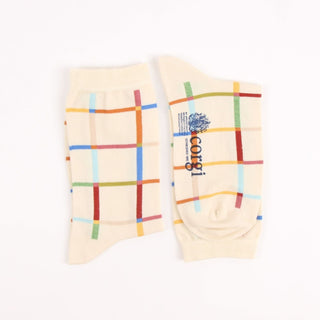 Pair of socks with colorful plaid pattern on a white background