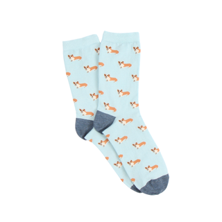 Light blue socks with dog pattern on a white background