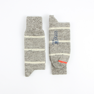 British Wool socks laid flat side by side on a white background.