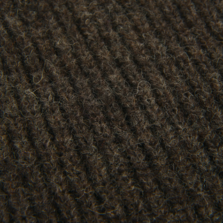 Close-up of brown textured knitted fabric