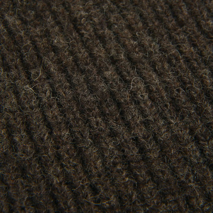 Close-up of brown textured knitted fabric