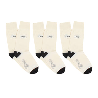 Set of six cream socks with black names and branding on a white background
