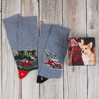 A Men's 2-Pair Christmas Truck Gift Box with a Christmas tree and truck design.