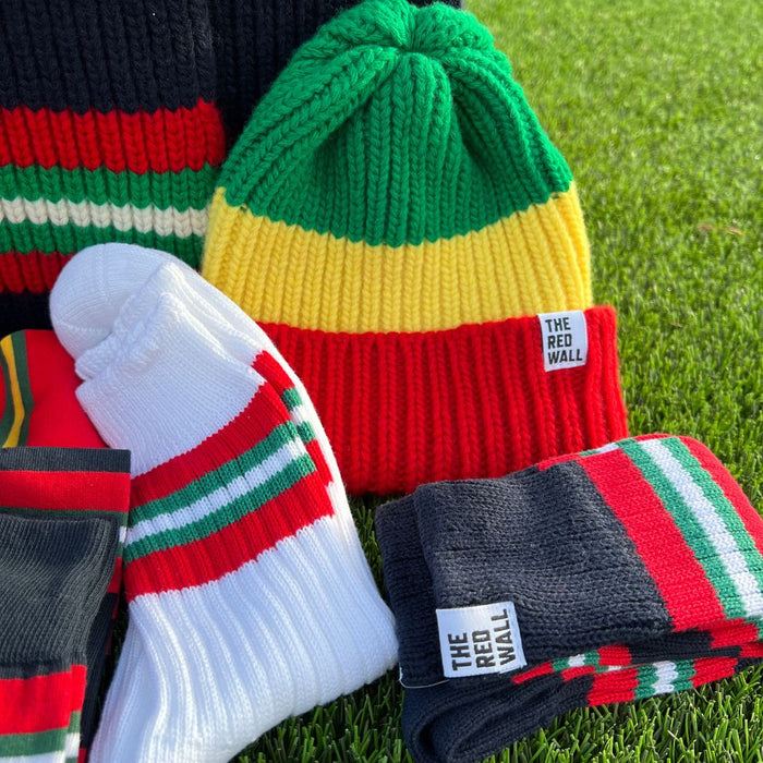 Collection of red wall products on a football field.