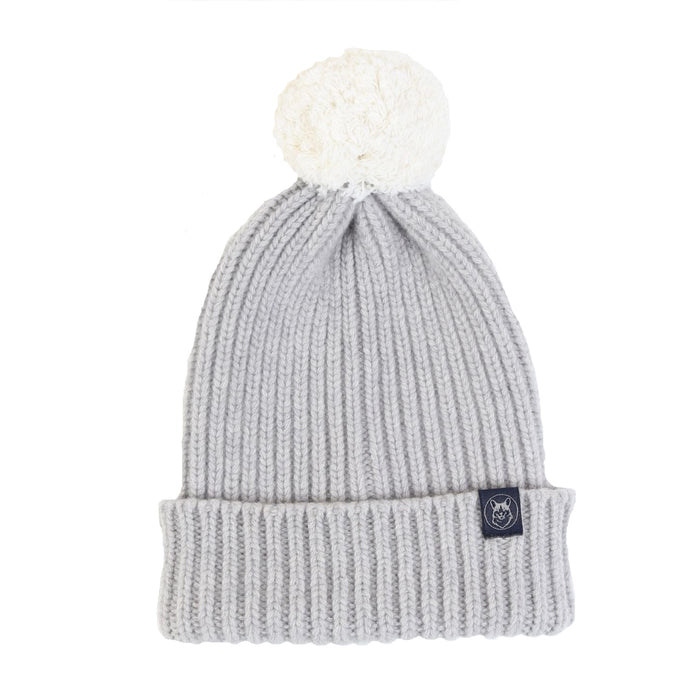 A women's two-tone wool beanie in grey with a plush pom pom on top.