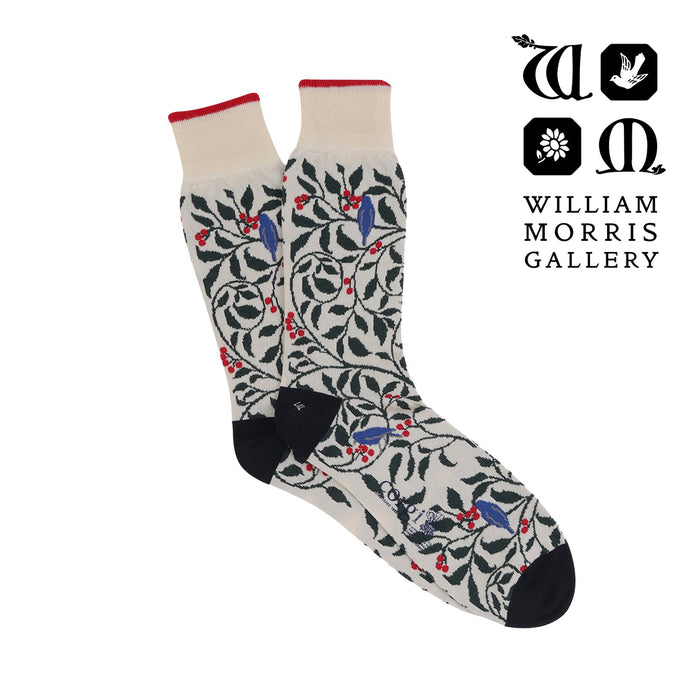 Pair of socks with leaf pattern and William Morris Gallery branding.