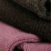 Close-up of dark brown and pink textured fabric