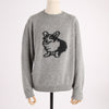 Gray sweater with a dog design on a mannequin against a white background