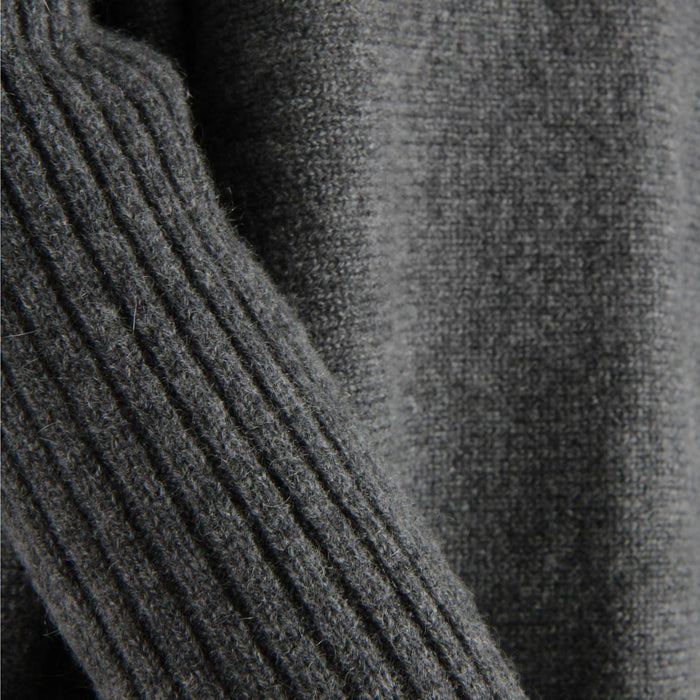 Close-up of a gray textured fabric with ribbed pattern