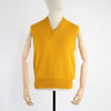 A yellow men's V-neck sleeveless sweater displayed on a mannequin.