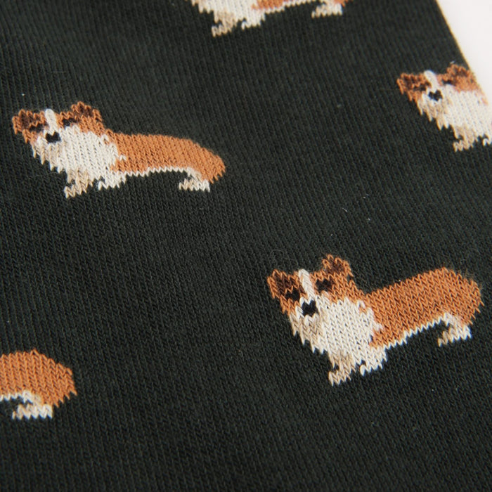 Green socks with brown and white corgi dog pattern