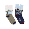 Two pairs of socks with nature and fishing themed designs photographed on a white background, 