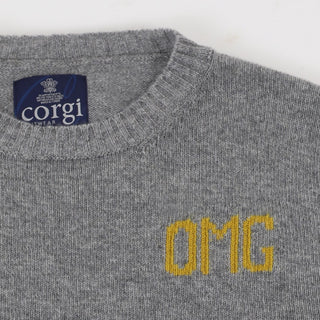 Gray sweater with 'OMG' in yellow text and Corgi label on a white background