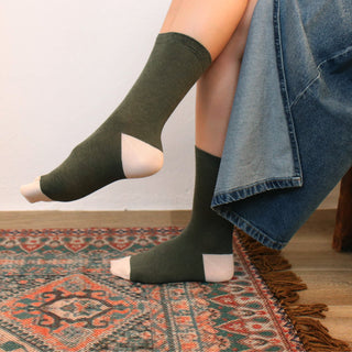 woman wearing khaki green cotton socks 